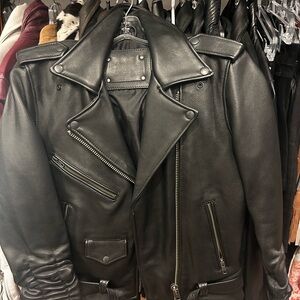 Understated Leather Moto Jacket - like new, size small with ruched sleeves.